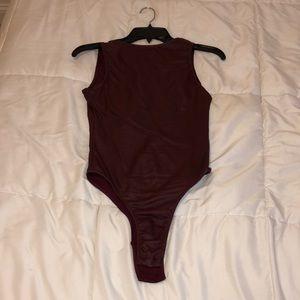 Red leather bodysuit